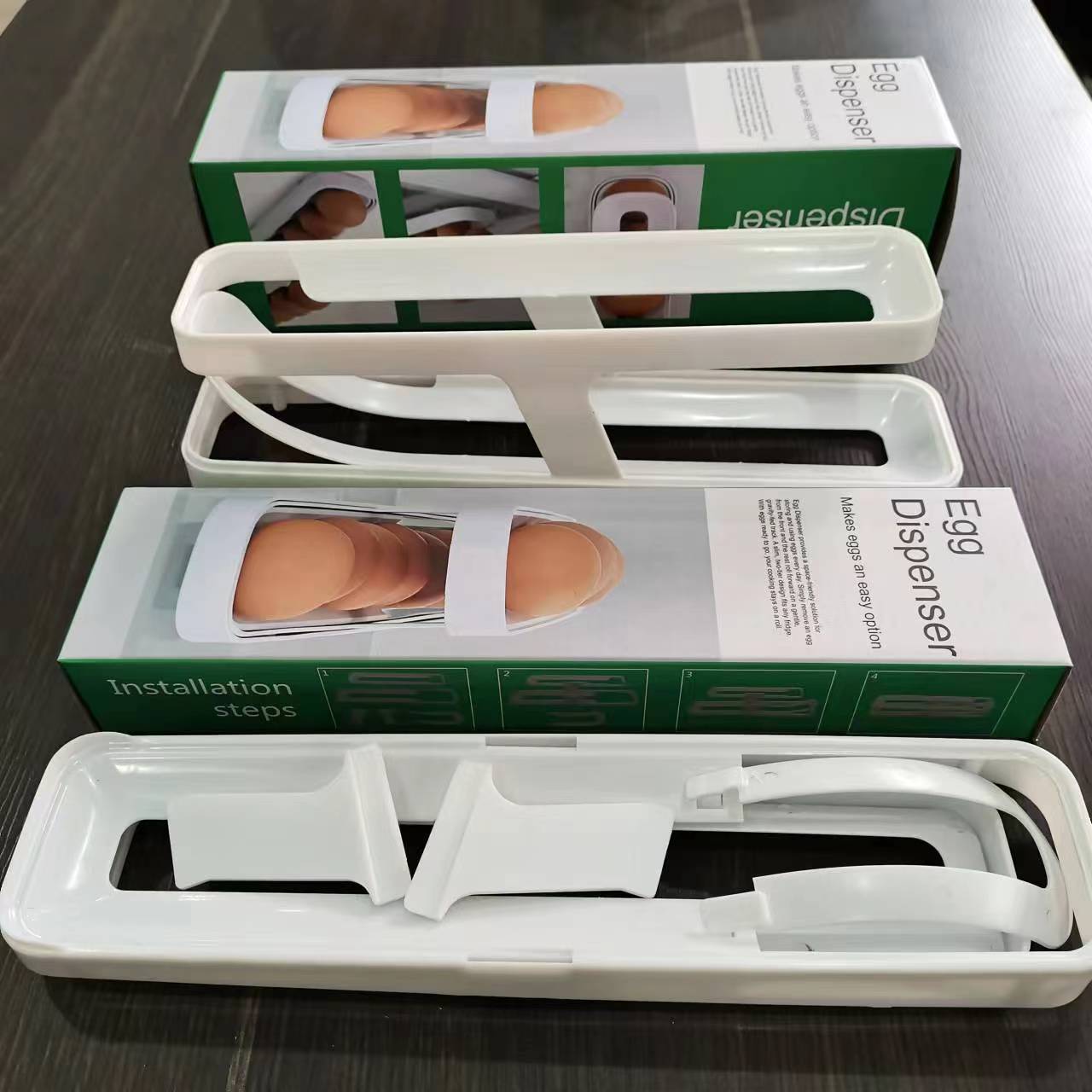 Oppbevaringsboks for automatisk rullende eggbrettholder